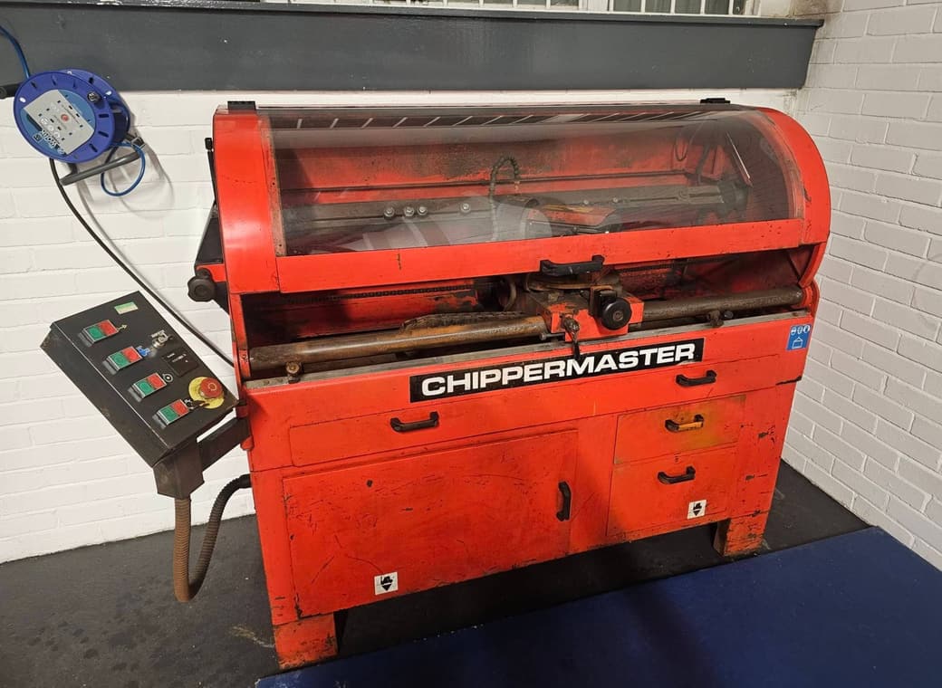 The Chippermaster knife grinder in the Sky-Arb workshop, with its control panel alongside